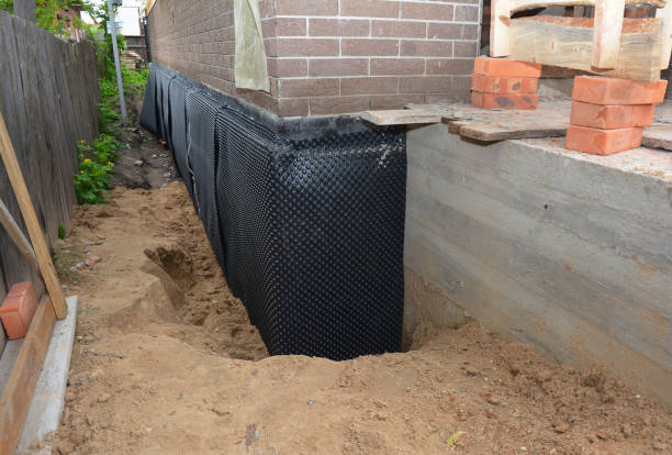 SJ Waterproofing Pros technician performing targeted Foundation Crack Repair assessment in Memphis, MI